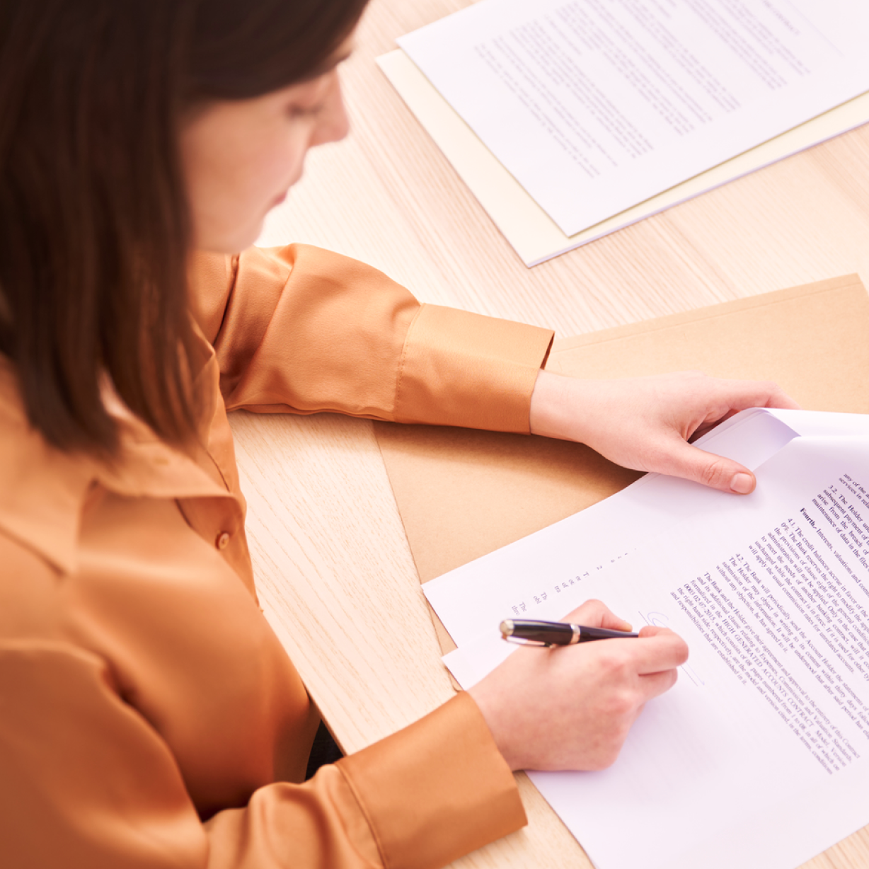 Attorney signing paperwork