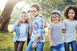 Children playing together in the park.