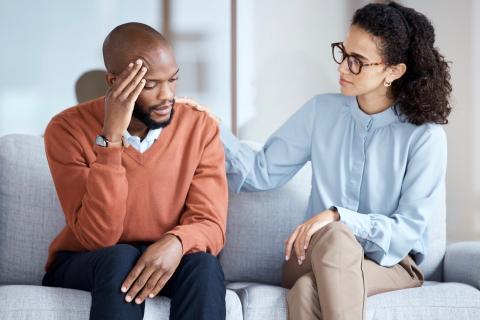 Man talking to mental health professional.