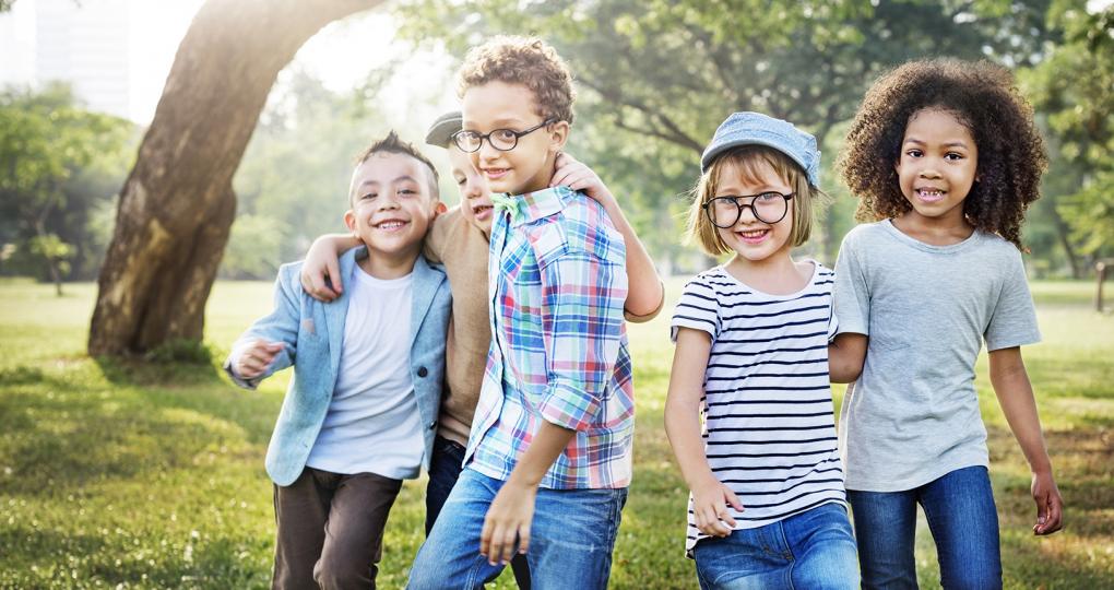 Children playing together in the park.