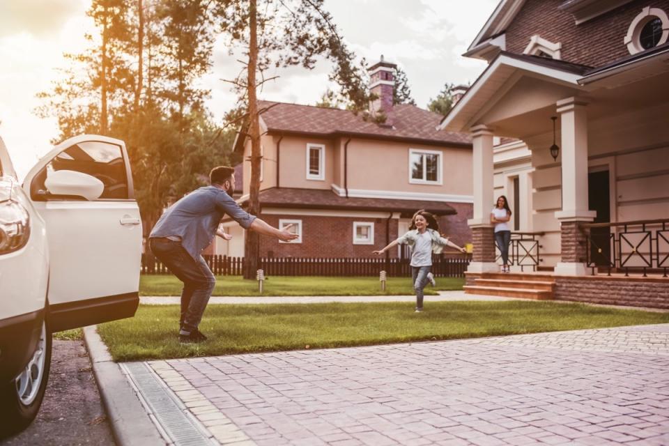 Family greets daughter during pick up.