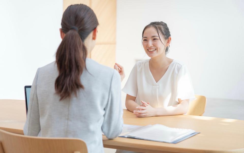 Two women meeting.